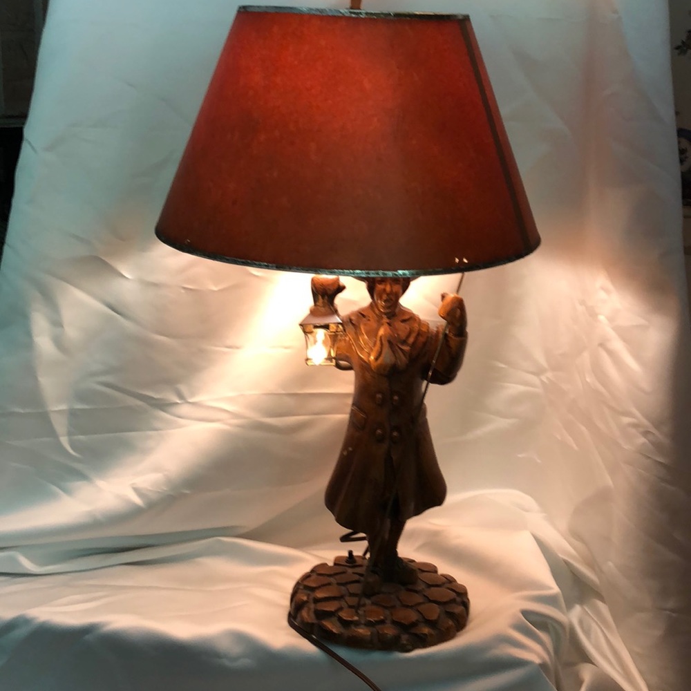 Unique vintage wood carved lamp with lamplighter